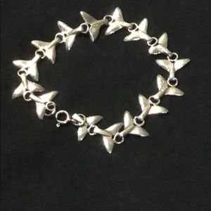 .925 sterling silver whale tail bracelet.